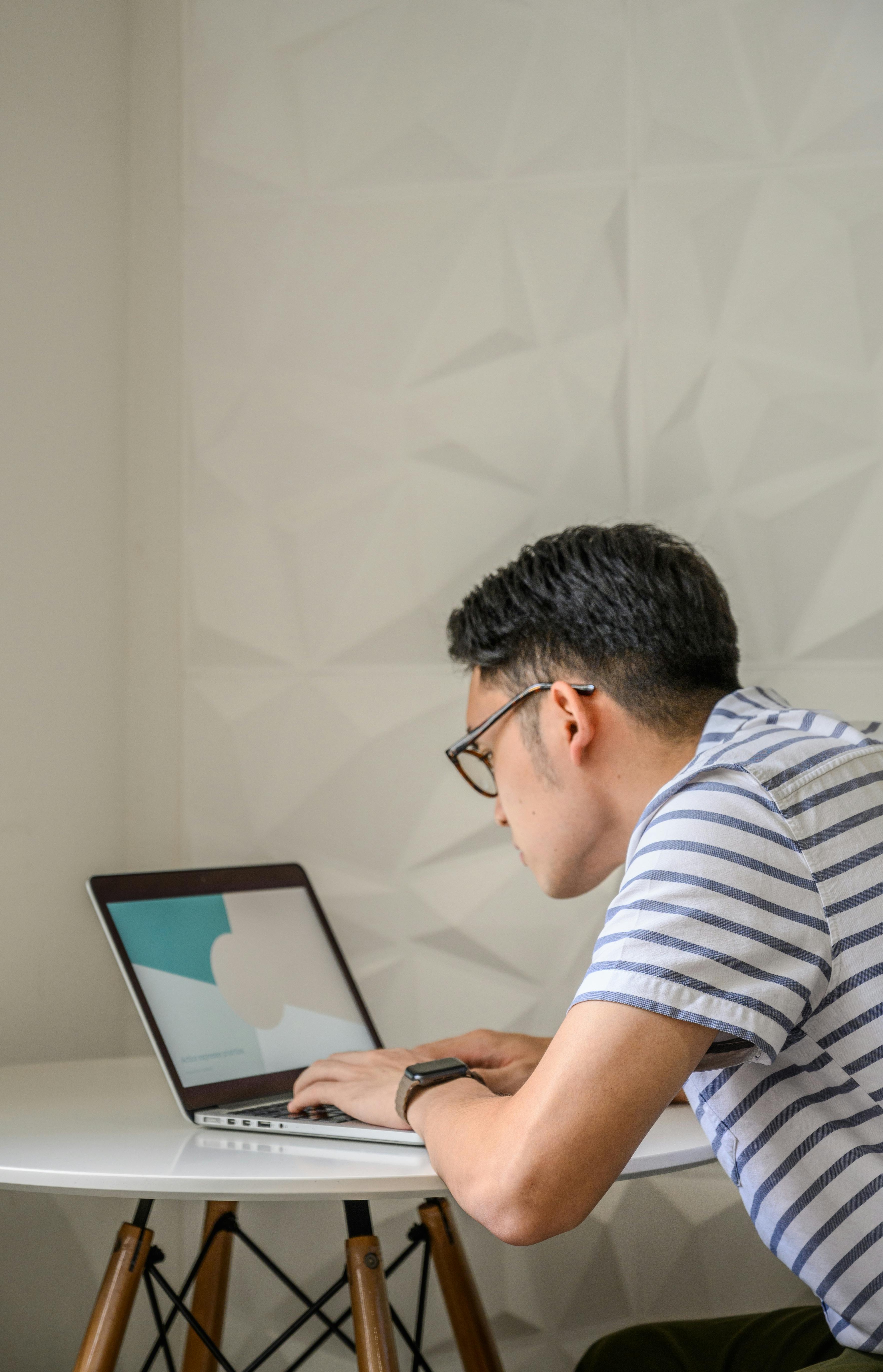 Asian IT team collaborating in a modern technology workspace